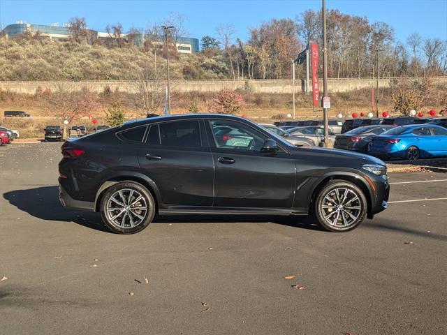 used 2023 BMW X6 car, priced at $58,900