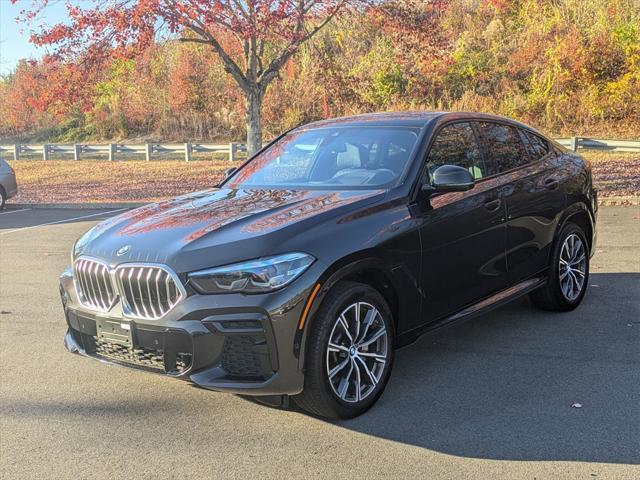 used 2023 BMW X6 car, priced at $58,900