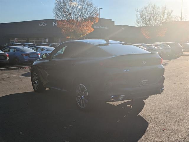 used 2023 BMW X6 car, priced at $58,900