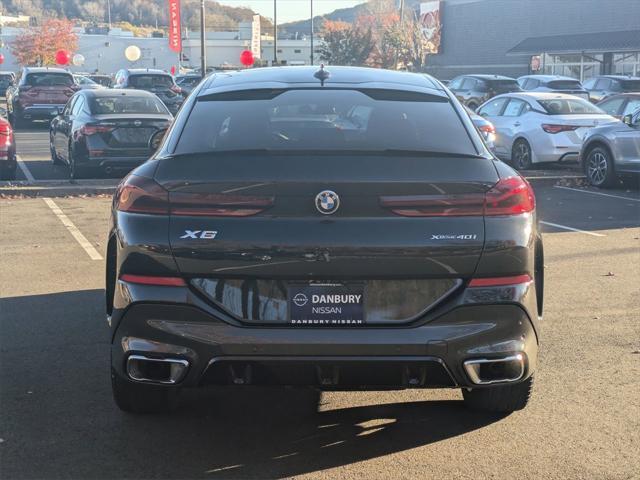 used 2023 BMW X6 car, priced at $58,900