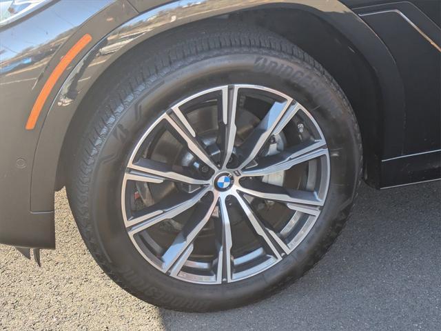 used 2023 BMW X6 car, priced at $58,900