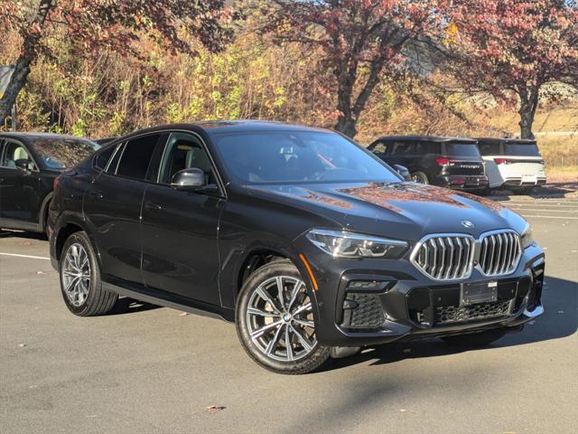 used 2023 BMW X6 car, priced at $58,900