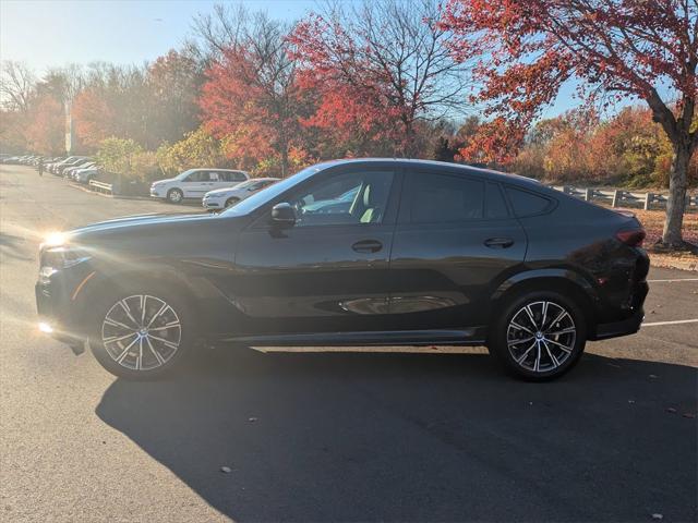 used 2023 BMW X6 car, priced at $58,900