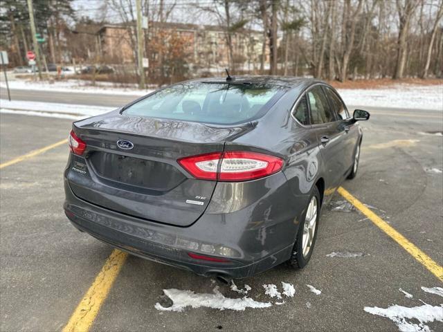 used 2015 Ford Fusion car, priced at $7,995