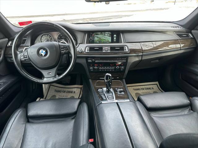 used 2013 BMW 750 car, priced at $13,495