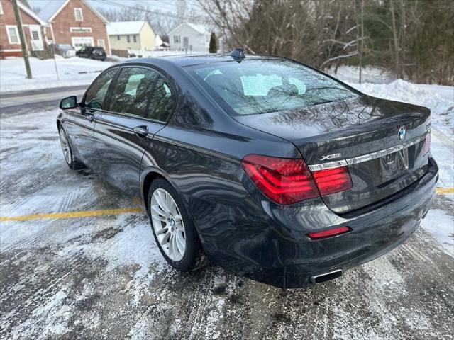 used 2013 BMW 750 car, priced at $13,495