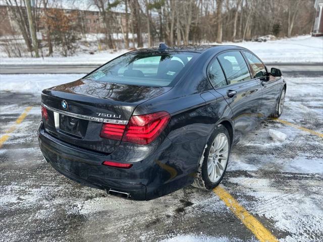 used 2013 BMW 750 car, priced at $13,495