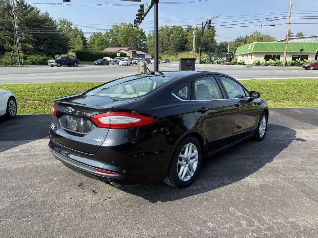 used 2014 Ford Fusion car, priced at $10,999