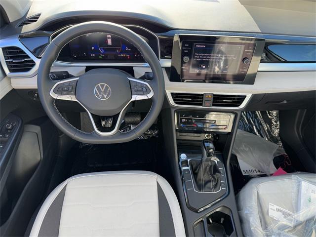 new 2025 Volkswagen Taos car, priced at $30,183