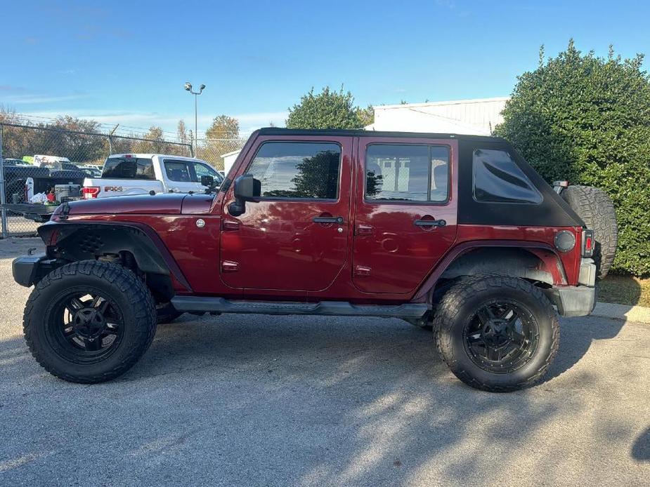 used 2010 Jeep Wrangler Unlimited car, priced at $14,500