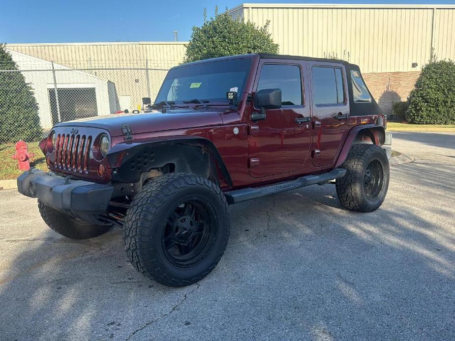 used 2010 Jeep Wrangler Unlimited car, priced at $16,977