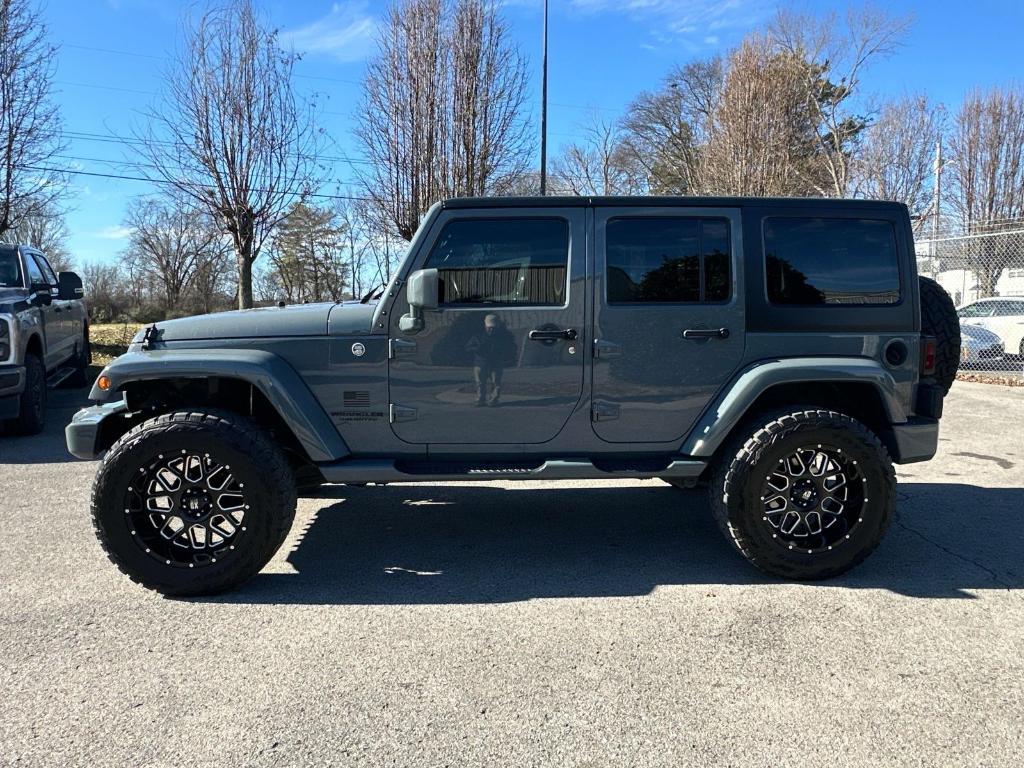 used 2015 Jeep Wrangler Unlimited car, priced at $23,975