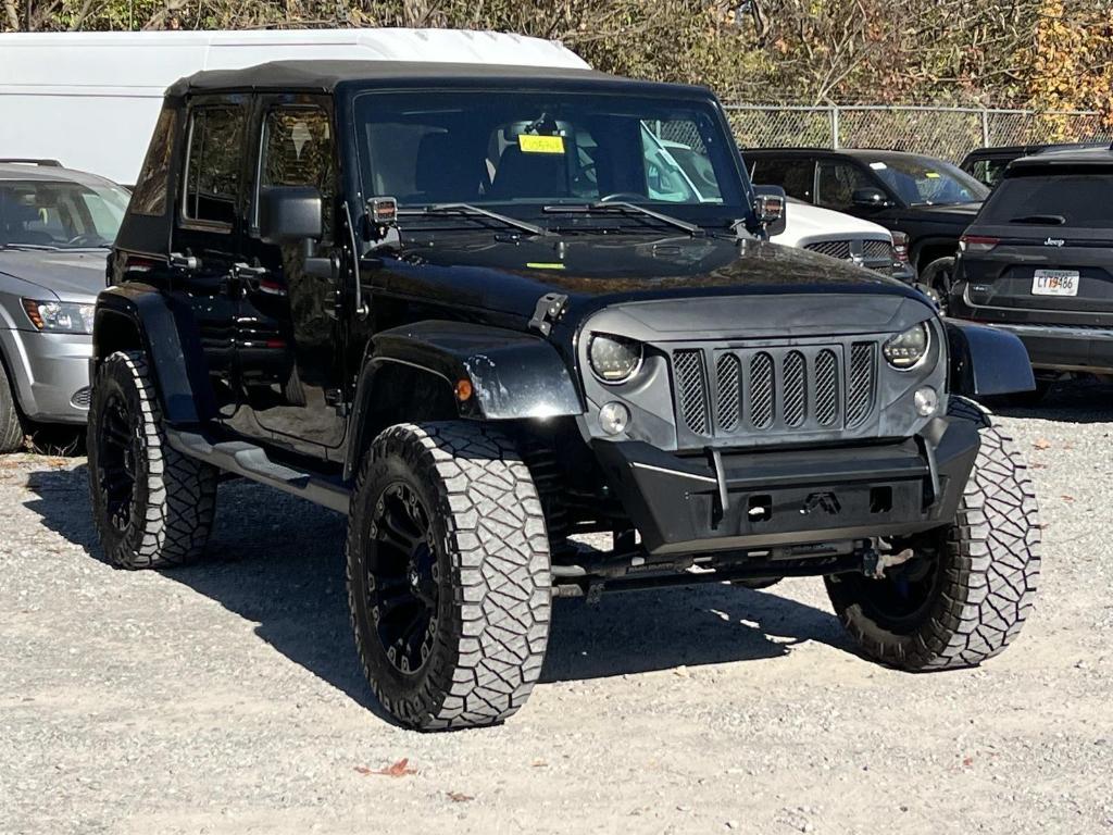 used 2016 Jeep Wrangler Unlimited car, priced at $18,577