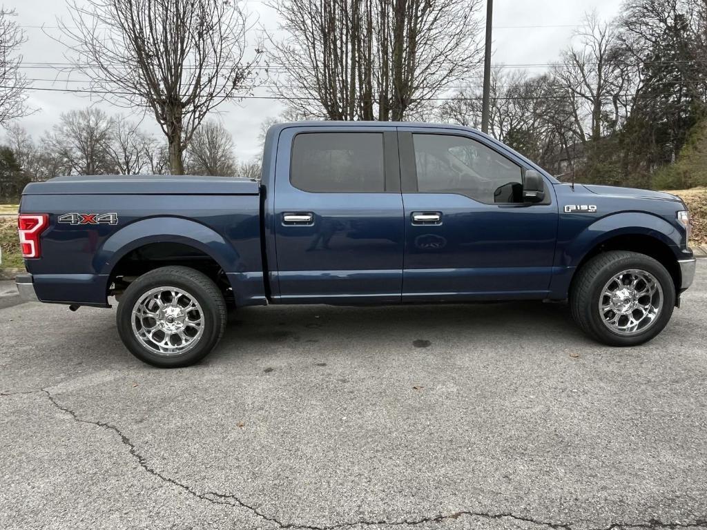 used 2018 Ford F-150 car, priced at $25,559