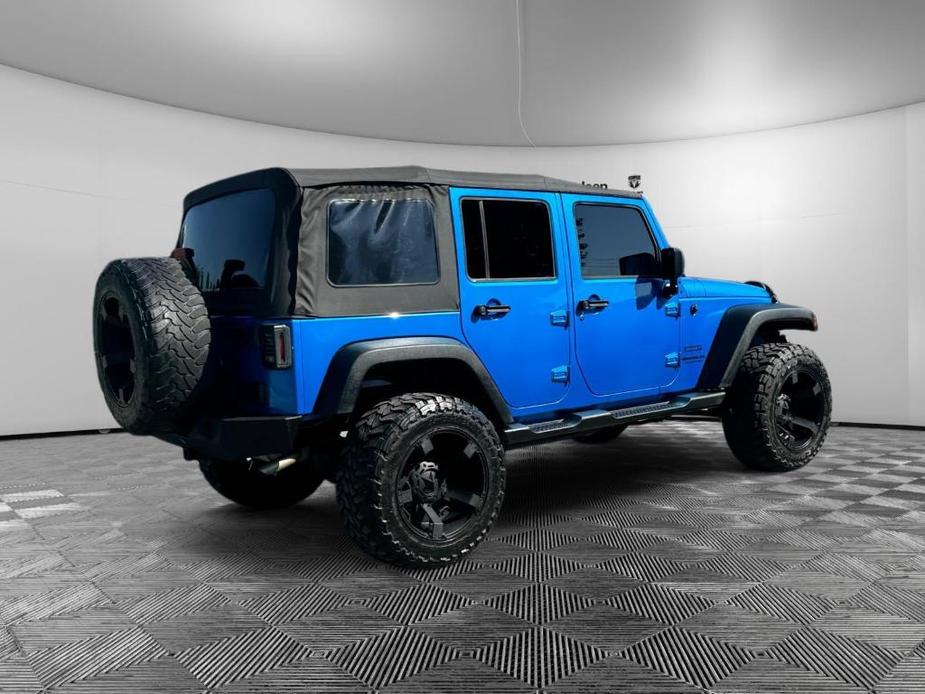 used 2015 Jeep Wrangler Unlimited car, priced at $22,550