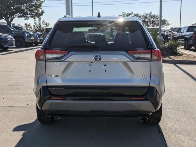 used 2021 Toyota RAV4 Hybrid car, priced at $29,894