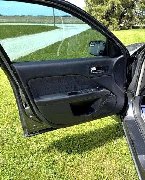 used 2012 Ford Fusion car, priced at $9,000