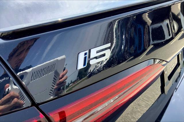 used 2025 BMW i5 car, priced at $65,000