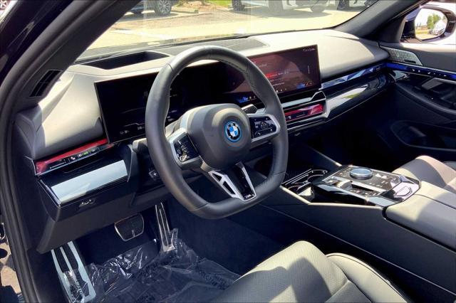 used 2025 BMW i5 car, priced at $65,000