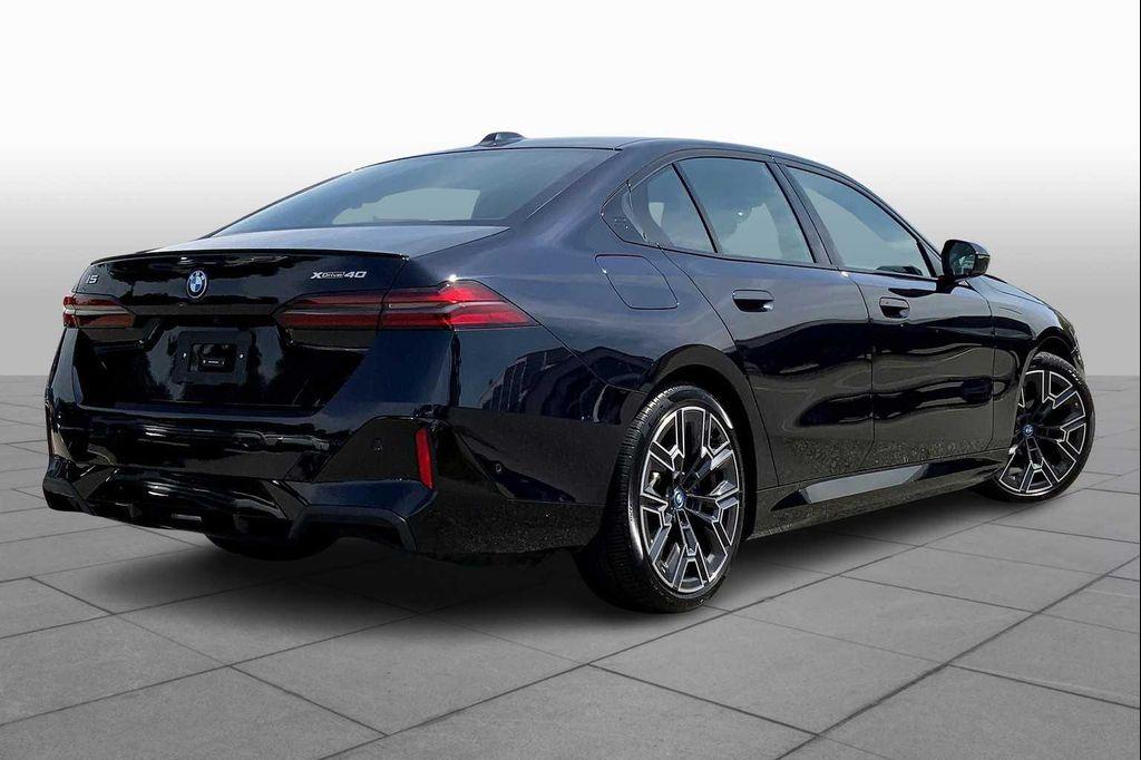 used 2025 BMW i5 car, priced at $63,997