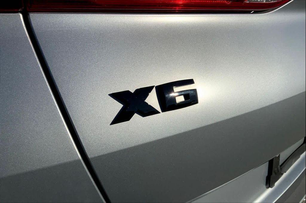 used 2025 BMW X6 car, priced at $86,687