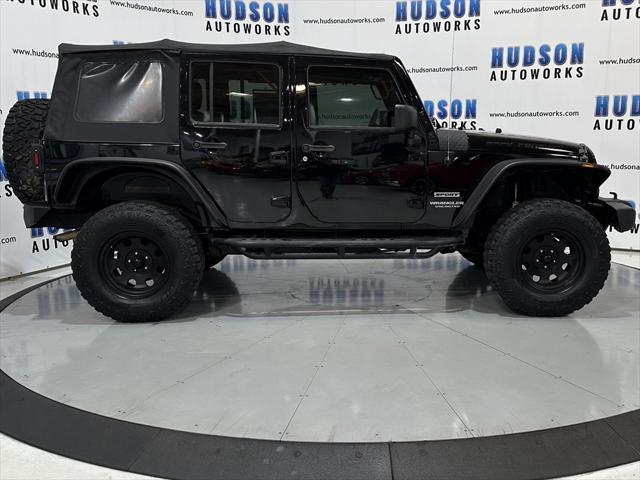 used 2014 Jeep Wrangler Unlimited car, priced at $15,393