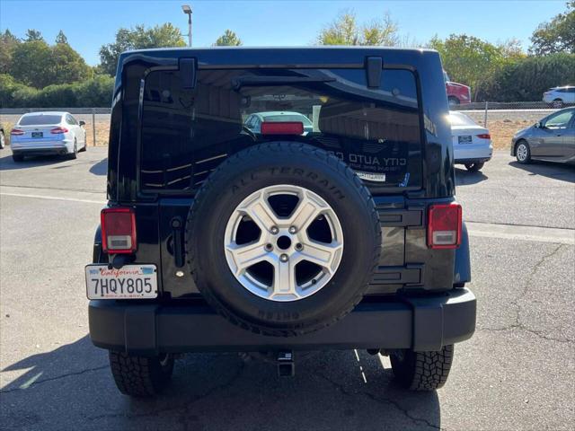 used 2015 Jeep Wrangler Unlimited car, priced at $19,999