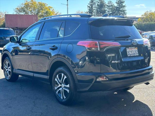 used 2018 Toyota RAV4 car, priced at $14,999