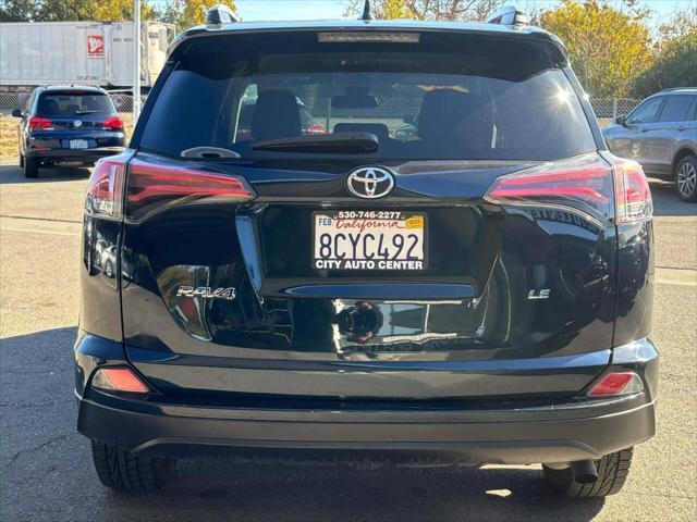 used 2018 Toyota RAV4 car, priced at $14,999