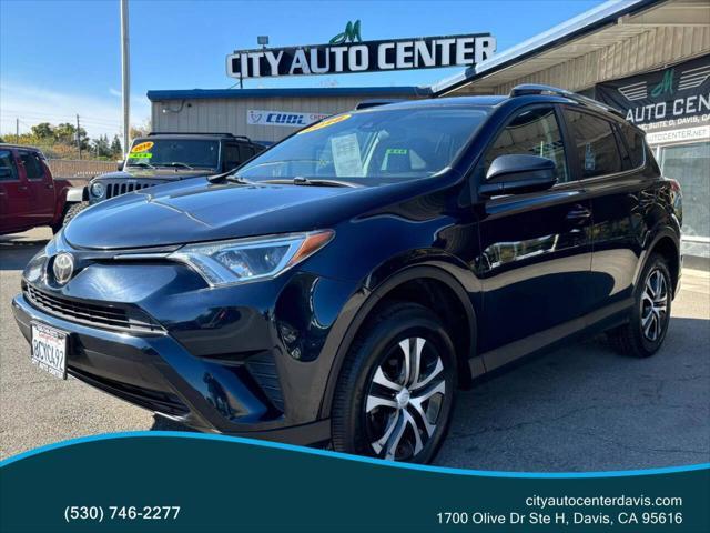 used 2018 Toyota RAV4 car, priced at $14,999