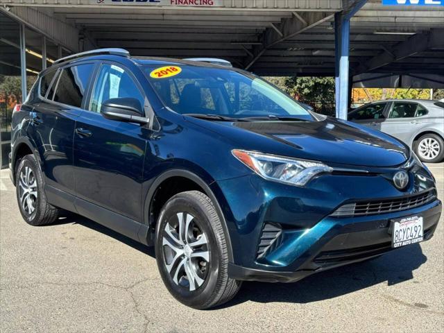 used 2018 Toyota RAV4 car, priced at $14,999