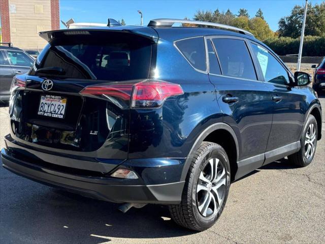 used 2018 Toyota RAV4 car, priced at $14,999