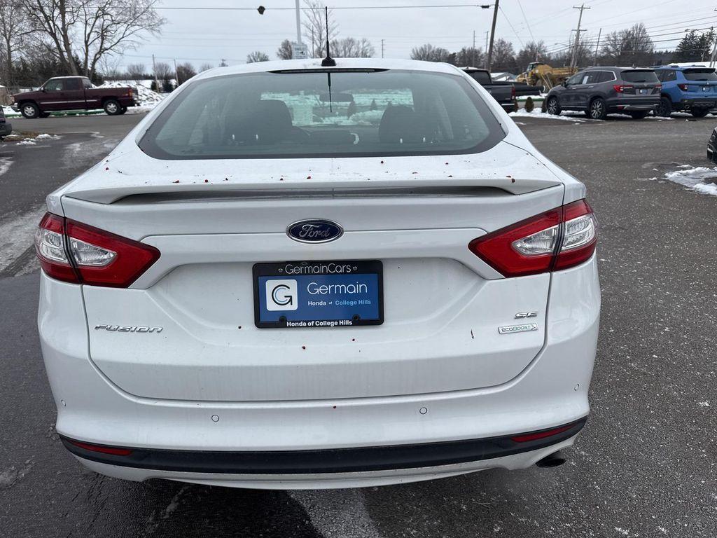 used 2016 Ford Fusion car, priced at $9,990