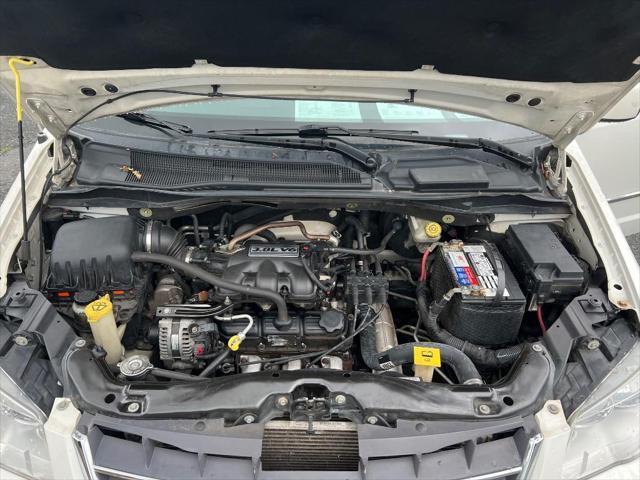 used 2010 Chrysler Town & Country car, priced at $5,499