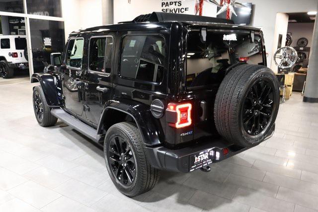 used 2021 Jeep Wrangler Unlimited car, priced at $36,331