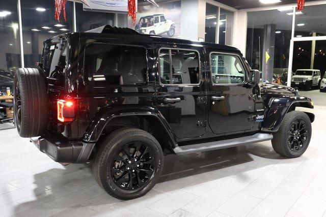 used 2021 Jeep Wrangler Unlimited car, priced at $36,331