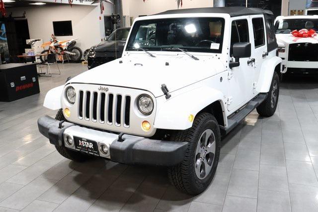 used 2018 Jeep Wrangler JK Unlimited car, priced at $23,500