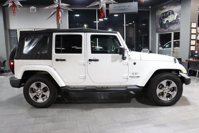 used 2018 Jeep Wrangler JK Unlimited car, priced at $23,500