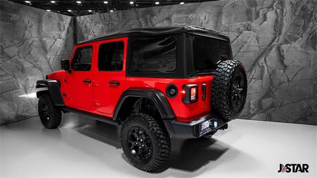 used 2023 Jeep Wrangler car, priced at $31,500