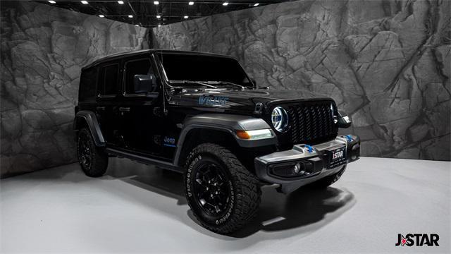 used 2023 Jeep Wrangler 4xe car, priced at $30,900