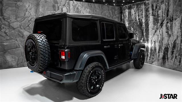 used 2023 Jeep Wrangler 4xe car, priced at $30,900