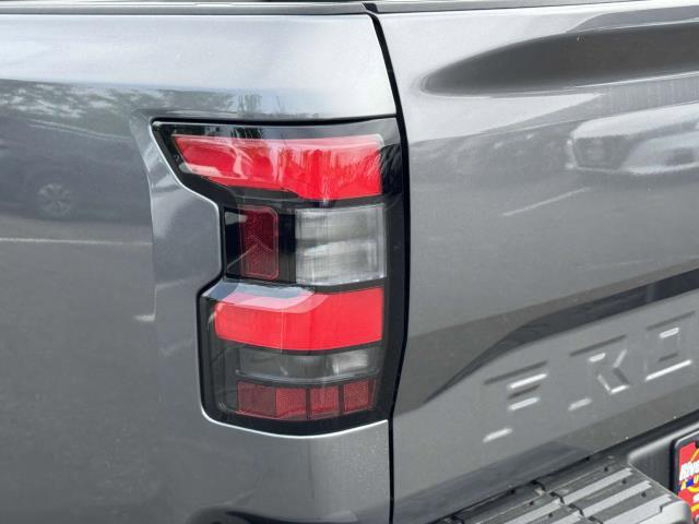 used 2025 Nissan Frontier car, priced at $33,990