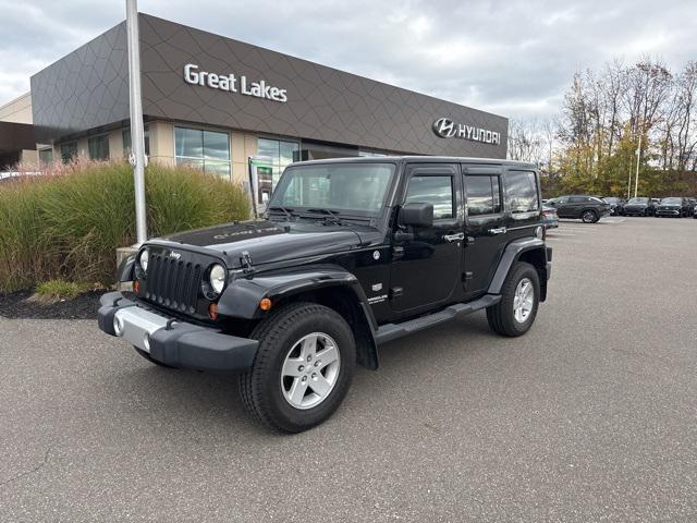 used 2011 Jeep Wrangler Unlimited car, priced at $13,811