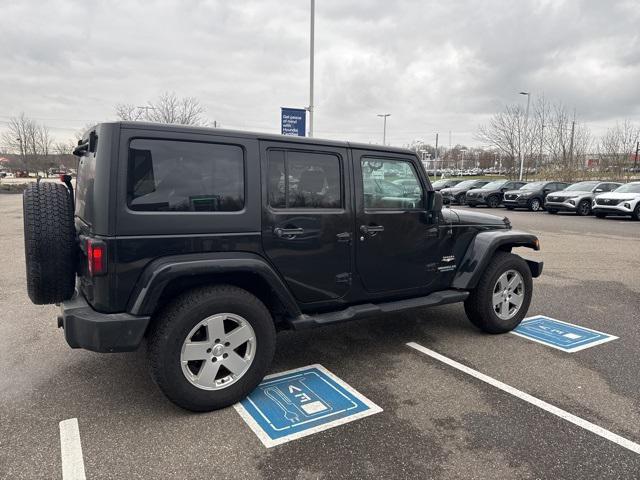 used 2010 Jeep Wrangler Unlimited car, priced at $14,611