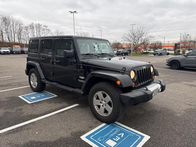 used 2010 Jeep Wrangler Unlimited car, priced at $14,611