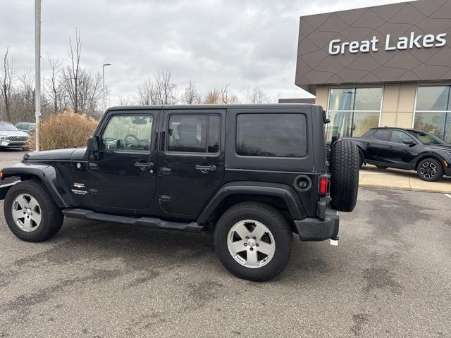 used 2010 Jeep Wrangler Unlimited car, priced at $14,611