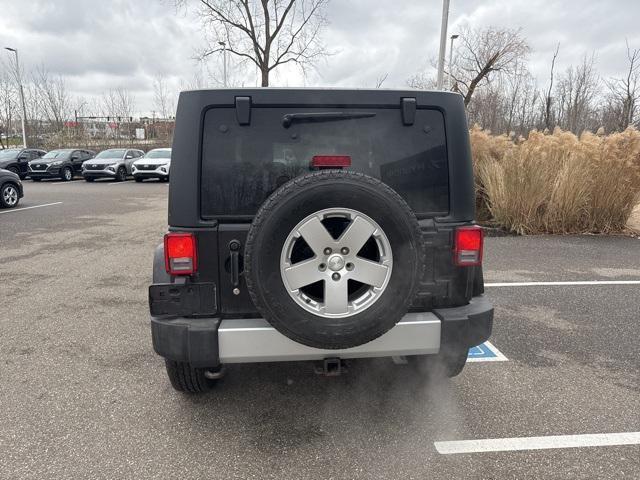 used 2010 Jeep Wrangler Unlimited car, priced at $14,611