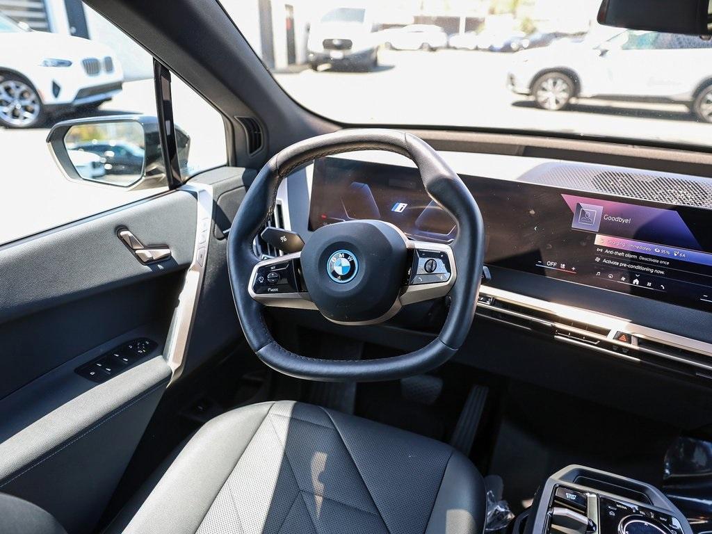 used 2025 BMW iX car, priced at $71,995