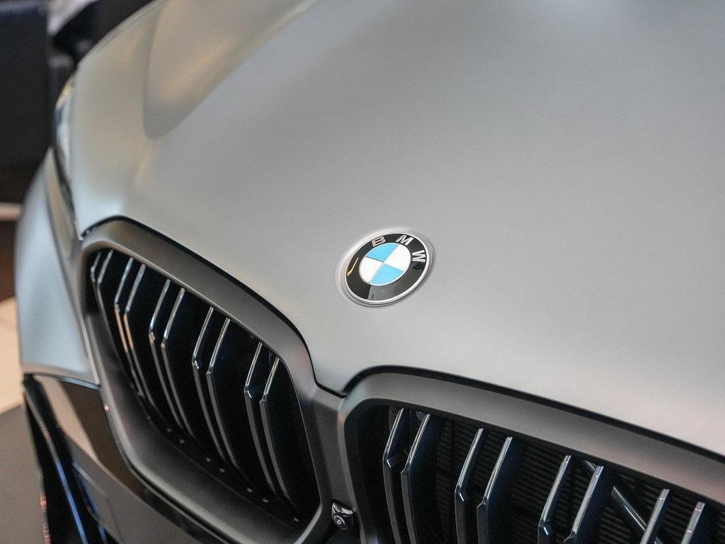 new 2025 BMW X6 car, priced at $108,975