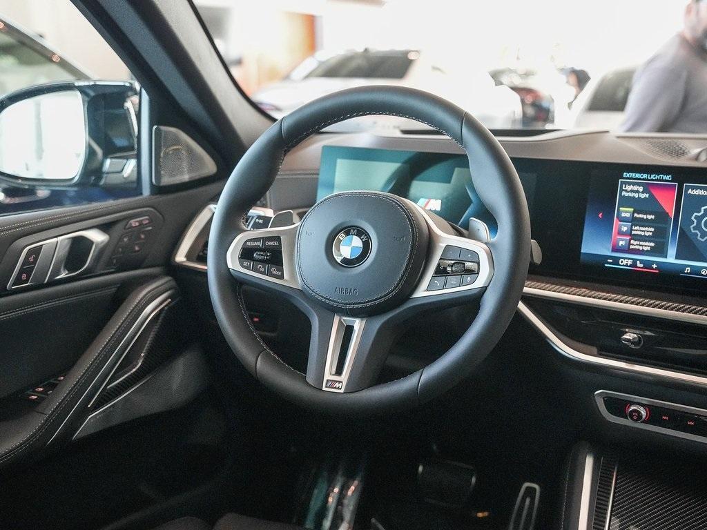 new 2025 BMW X6 car, priced at $108,975